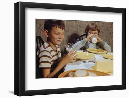 Children Drinking Milk at Dinner Table-William P. Gottlieb-Framed Photographic Print