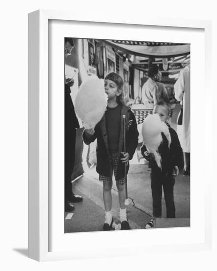 Children Eating Cotton Candy Given by a League of Women Voters-Ralph Crane-Framed Photographic Print