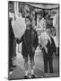 Children Eating Cotton Candy Given by a League of Women Voters-Ralph Crane-Mounted Photographic Print