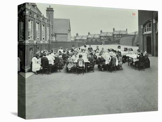 Children Eating Dinner at Tables in the Playground, Shrewsbury House Open Air School, London, 1908-null-Stretched Canvas