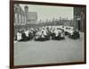 Children Eating Dinner at Tables in the Playground, Shrewsbury House Open Air School, London, 1908-null-Framed Photographic Print