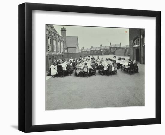 Children Eating Dinner at Tables in the Playground, Shrewsbury House Open Air School, London, 1908-null-Framed Photographic Print