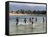 Children Enjoy a Boat Race in a Lagoon at Qalansiah, an Important Fishing Village in the Northwest-Nigel Pavitt-Framed Stretched Canvas