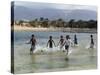 Children Enjoy a Boat Race in a Lagoon at Qalansiah, an Important Fishing Village in the Northwest-Nigel Pavitt-Stretched Canvas