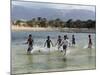 Children Enjoy a Boat Race in a Lagoon at Qalansiah, an Important Fishing Village in the Northwest-Nigel Pavitt-Mounted Photographic Print