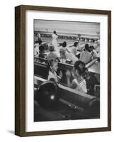 Children Entertaining Themselves While Their Mothers Compete in Bowling League-Stan Wayman-Framed Photographic Print