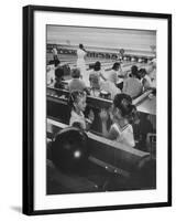 Children Entertaining Themselves While Their Mothers Compete in Bowling League-Stan Wayman-Framed Photographic Print