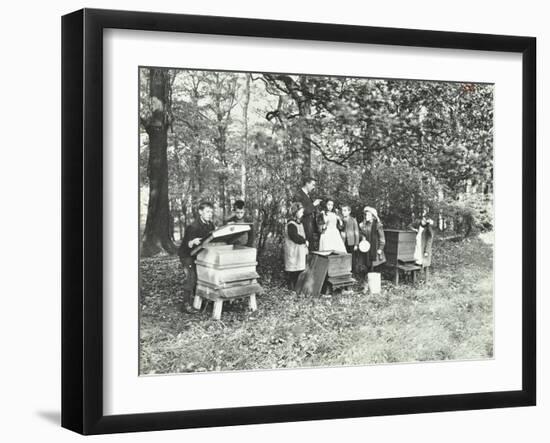 Children Feeding Bees for the Winter, Shrewsbury House Open Air School, London, 1909-null-Framed Premium Photographic Print