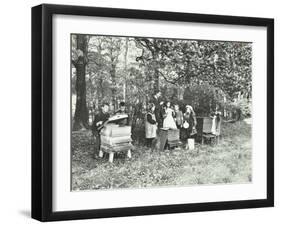 Children Feeding Bees for the Winter, Shrewsbury House Open Air School, London, 1909-null-Framed Premium Photographic Print