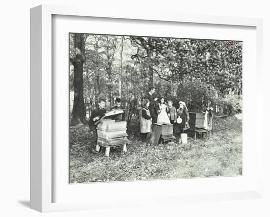 Children Feeding Bees for the Winter, Shrewsbury House Open Air School, London, 1909-null-Framed Premium Photographic Print