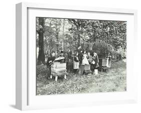 Children Feeding Bees for the Winter, Shrewsbury House Open Air School, London, 1909-null-Framed Premium Photographic Print