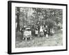 Children Feeding Bees for the Winter, Shrewsbury House Open Air School, London, 1909-null-Framed Premium Photographic Print