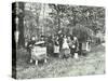 Children Feeding Bees for the Winter, Shrewsbury House Open Air School, London, 1909-null-Stretched Canvas