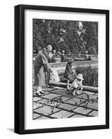 Children Feeding the Sparrows in Hyde Park, London, 1926-1927-null-Framed Giclee Print