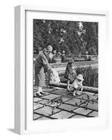 Children Feeding the Sparrows in Hyde Park, London, 1926-1927-null-Framed Giclee Print