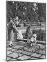Children Feeding the Sparrows in Hyde Park, London, 1926-1927-null-Mounted Giclee Print