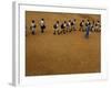 Children Follow Their Teacher as They Head Back to School for the First Time after the Tsunami-null-Framed Photographic Print