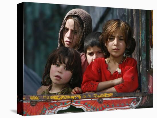 Children from Swat Arrive on a Truck at a Refugee Camp in Mardan, Northwest Pakistan-null-Stretched Canvas