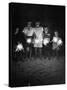 Children Holding Sparklers on a Beach-Lisa Larsen-Stretched Canvas