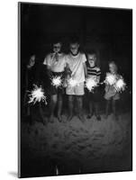 Children Holding Sparklers on a Beach-Lisa Larsen-Mounted Photographic Print