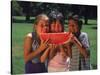 Children in Park Eating Watermelon-Mark Gibson-Stretched Canvas