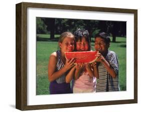 Children in Park Eating Watermelon-Mark Gibson-Framed Premium Photographic Print