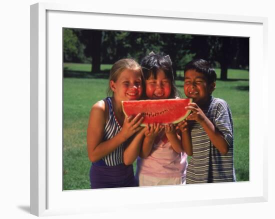 Children in Park Eating Watermelon-Mark Gibson-Framed Photographic Print