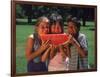 Children in Park Eating Watermelon-Mark Gibson-Framed Photographic Print
