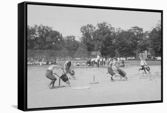 Children In Wheel Barrow Race-null-Framed Stretched Canvas