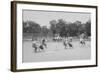 Children In Wheel Barrow Race-null-Framed Art Print