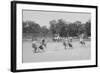 Children In Wheel Barrow Race-null-Framed Art Print