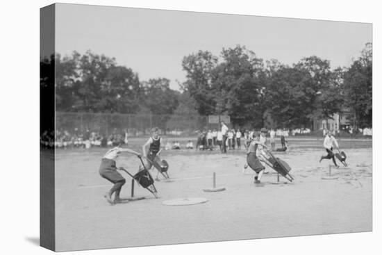 Children In Wheel Barrow Race-null-Stretched Canvas