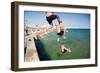 Children Jumping into the Sea from Stone Jetty-Felipe Rodriguez-Framed Photographic Print