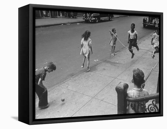 Children Jumping Rope on Sidewalk-Ed Clark-Framed Stretched Canvas