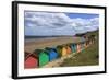 Children Kick Football Near Colourful Beach Huts Above West Cliff Beach-Eleanor Scriven-Framed Photographic Print