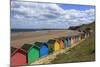 Children Kick Football Near Colourful Beach Huts Above West Cliff Beach-Eleanor Scriven-Mounted Photographic Print