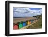 Children Kick Football Near Colourful Beach Huts Above West Cliff Beach-Eleanor Scriven-Framed Photographic Print