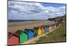 Children Kick Football Near Colourful Beach Huts Above West Cliff Beach-Eleanor Scriven-Mounted Photographic Print