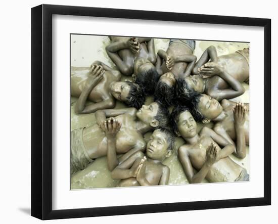 Children Lie in Sludge as a Ritual to Induce Rain in Nari Bari, India-null-Framed Photographic Print