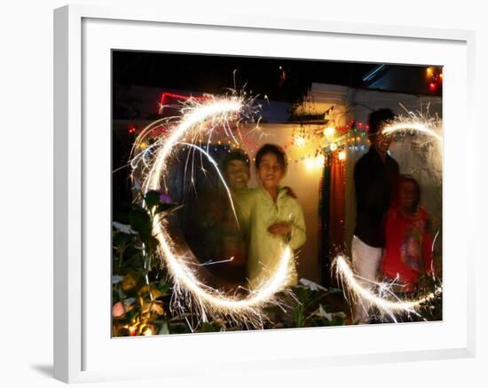 Children Light Firecrackers for the Hindu Festival of Diwali in New Delhi, India, Oct. 20, 2006-Manish Swarup-Framed Photographic Print