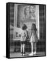 Children Looking at Posters Outside Movie Theater-Charles E^ Steinheimer-Framed Stretched Canvas