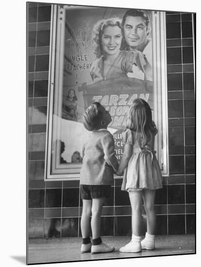 Children Looking at Posters Outside Movie Theater-Charles E^ Steinheimer-Mounted Photographic Print