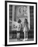 Children Looking at Posters Outside Movie Theater-Charles E^ Steinheimer-Framed Photographic Print