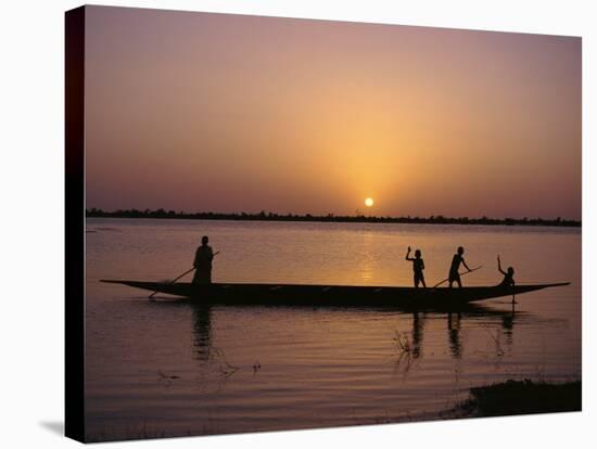 Children on Local Pirogue or Canoe on the Bani River at Sunset at Sofara, Mali, Africa-Pate Jenny-Stretched Canvas