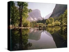 Children on Rocks on Mirror Lake in Yosemite National Park with Mountain Rising in the Background-Ralph Crane-Stretched Canvas