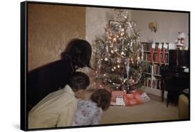 Children Peeking around Corner at Christmas Tree-William P. Gottlieb-Framed Stretched Canvas