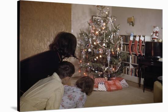Children Peeking around Corner at Christmas Tree-William P. Gottlieb-Stretched Canvas