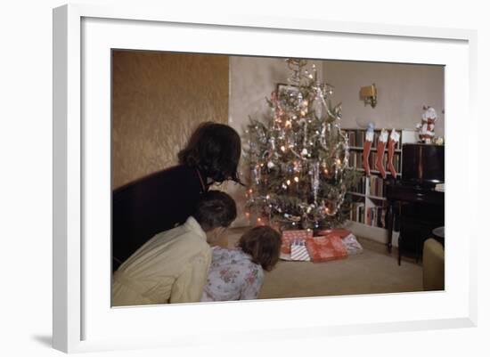 Children Peeking around Corner at Christmas Tree-William P. Gottlieb-Framed Photographic Print