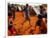 Children Play Soccer Between Tents Placed on a Dusty Lot-null-Framed Photographic Print