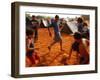 Children Play Soccer Between Tents Placed on a Dusty Lot-null-Framed Photographic Print